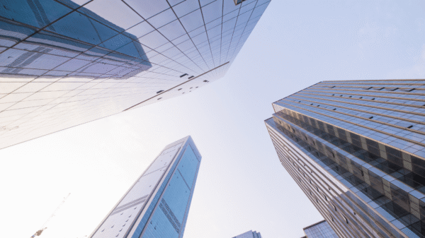image of glass skyscrapers in a city representing the foundations of a certified data centre